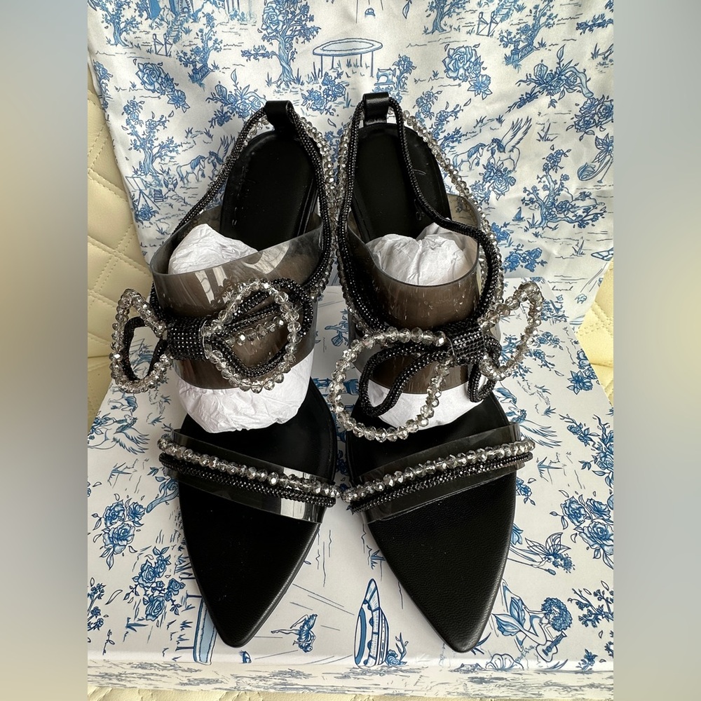 She is Chavel Laser Kitty 3000 labyrinth heel NWT